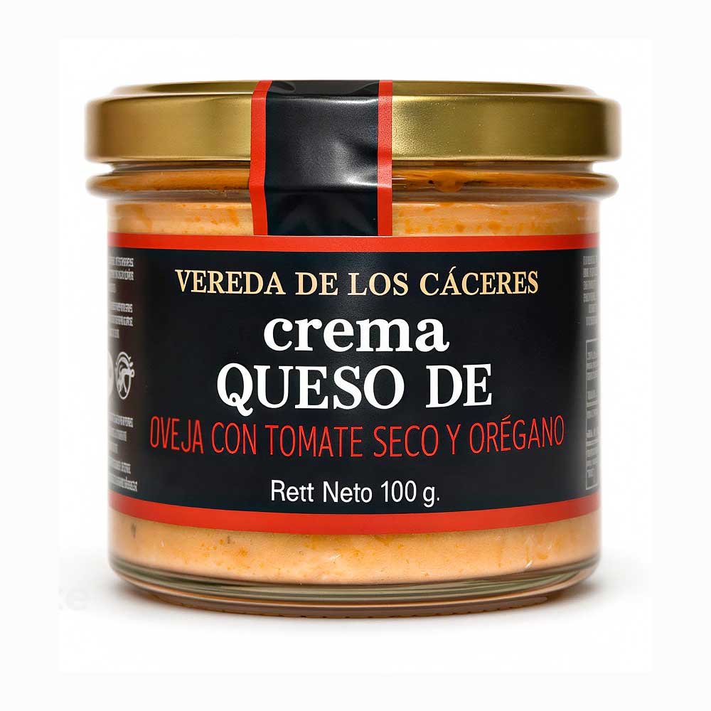 Tarro de crema de queso de oveja con tomate seco y orégano.